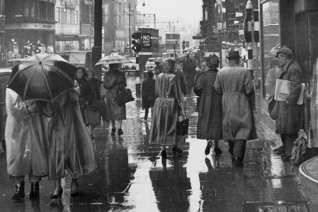 A very wet Briggate on August Bank Holiday in the mid-1950s.