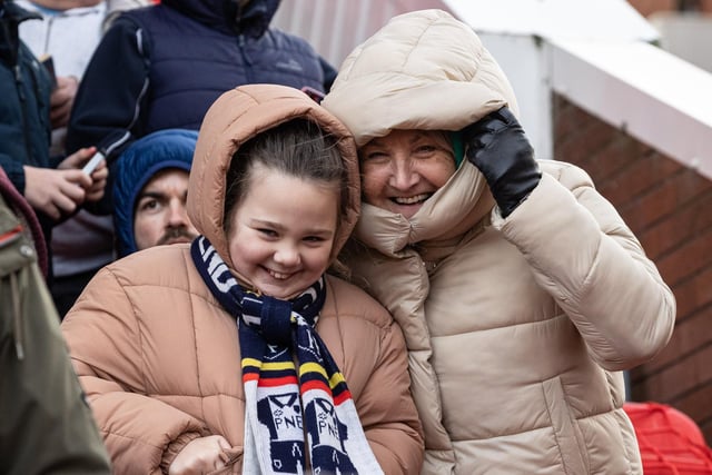 These two PNE fans have their hoods up to keep out the cold at Stoke