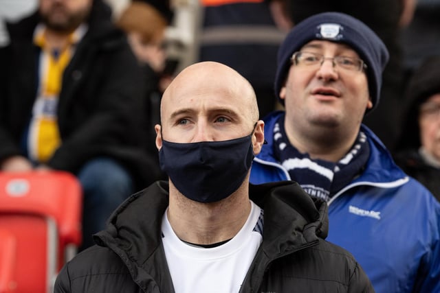 A PNE supporter wearing a face mask at Stoke