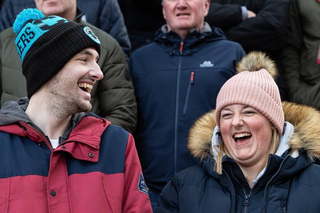 Two PNE fans enjoy a laugh ahead of the victory at Stoke