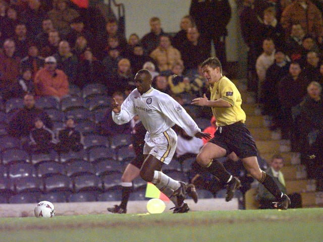 Striker Jimmy Floyd-Hasselbaink drives forward.