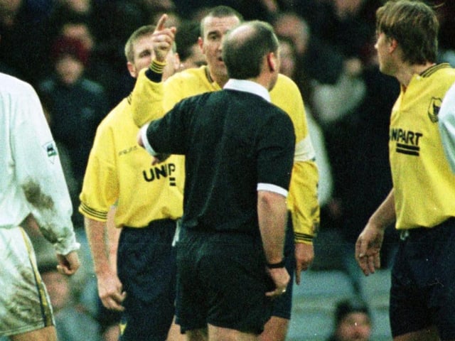 Referee Mike Reed sends of Oxford United midfielder Martin Gray.