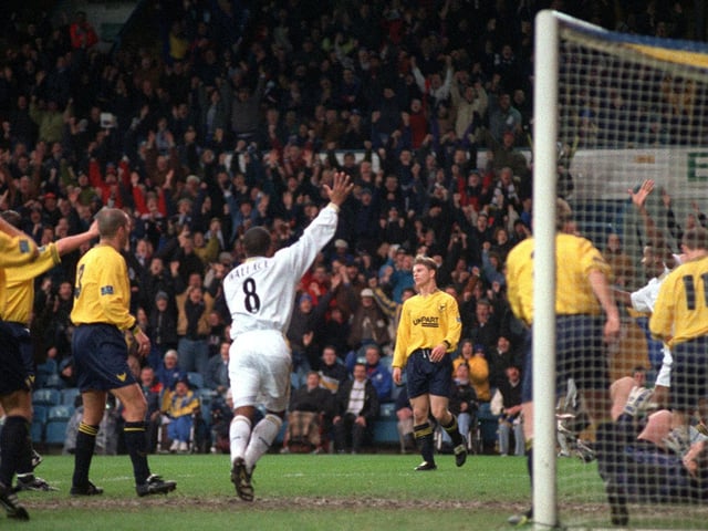 Oxford United goalkeeper Phil Whitehead and his teammates are left dejected after Lucas Radebe scored his first ever goal for Leeds United.