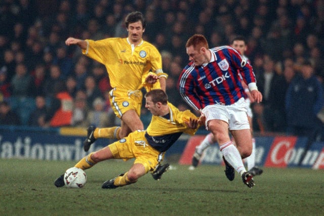 Lee Bowyer is pulled to the ground by David Hopkin.