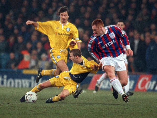 Lee Bowyer is pulled to the ground by David Hopkin.