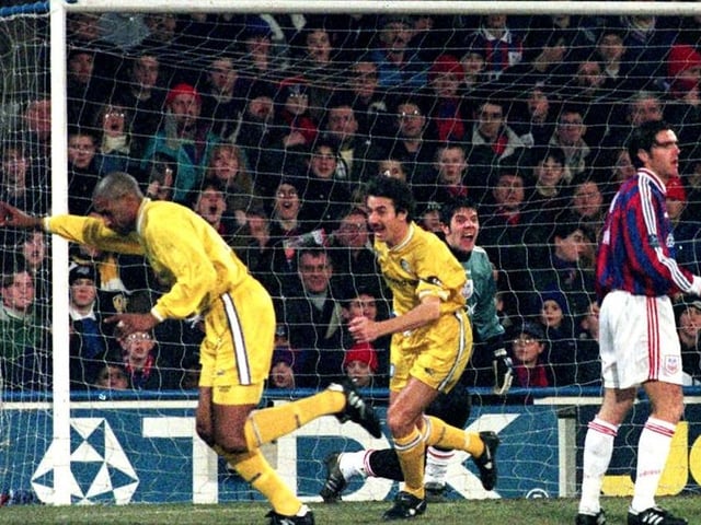 Brian Deane (left) turns away after putting his side into the lead. PIC: Adam Butler/PA