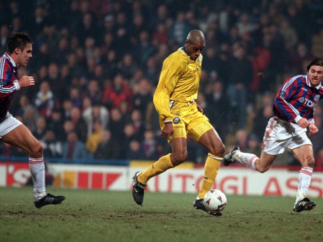 Brian Deane is clean through in the dying minutes of the game, but delivers a weak shot on goal.