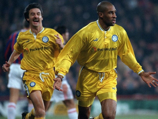 Striker Brian Deane celebrates after scoring the opening goal of the game after just three minutes.