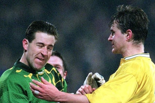 Nigel Martyn is congratulated by teammate David Wetherall after he saved the penalty. PIC: Adam Butler/PA