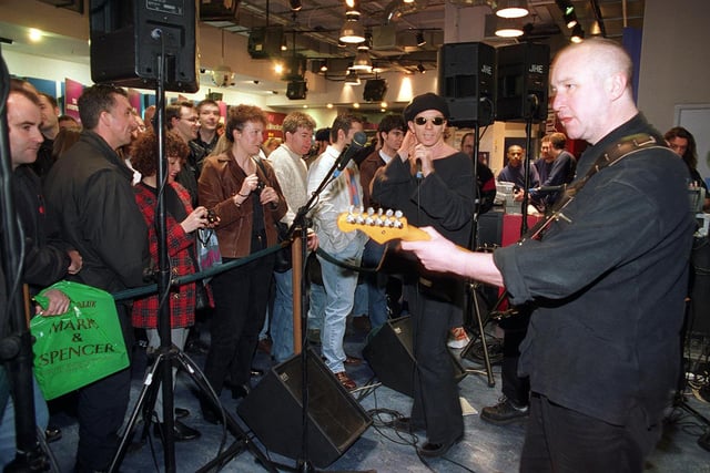 Paul Roberts (vocals) and John Ellis (guitar) of The Stranglers during an acoustic set by the band at the HMV store in Leeds to promote their new album 'Written in Red'.