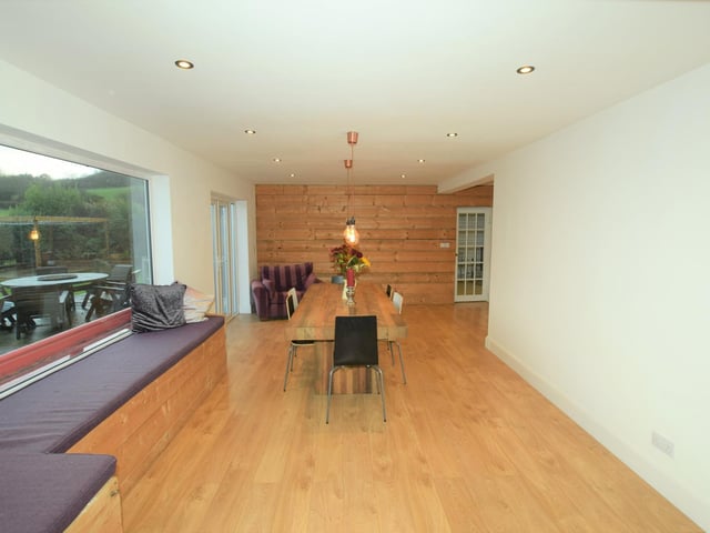 A window seat is a feature of the light and bright room withint he property.