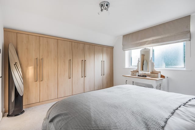 This double bedroom has fitted wardrobes, creating both style and space