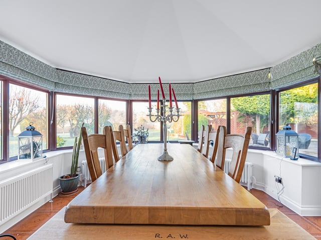 Another highly flexible space that could be used as dining room, sitting room, play room or many other alternatives