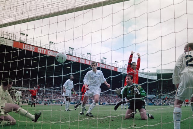 Manchester United players celebrate an own goal by Nigel Martyn during the Premier League clash at Elland Road in September 1996.