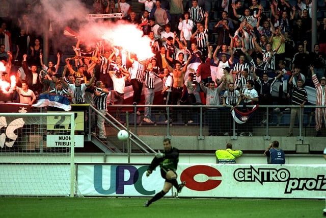Partizan Belgrade fans are in good spirits as Nigel Martyn takes a goal kick during the UEFA Cup first round, first leg clash at the Abe Lenstra Stadium at Heerenveen in Holland. Leeds won 3-1.