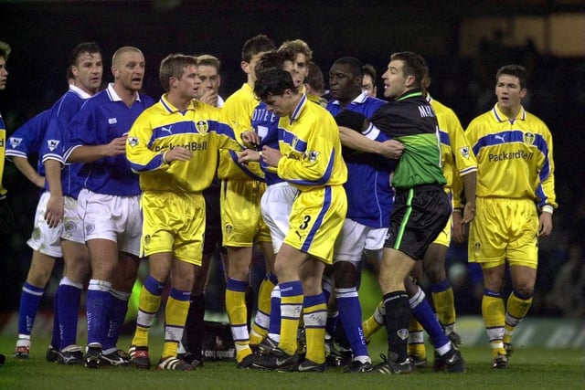 Leicester City striker Emile Heskey is held back by Nigel Martyn during the Worthington Cup fourth round clash at Filbert Street in December 1999.