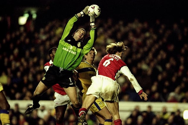 Nigel Martyn rises high to claim the ball under pressure from Arsenal's Tony Adams during the Premier League clash at Highbury in December 1999. The Gunners won 2-0.