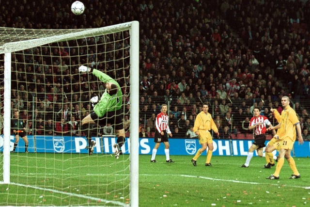 Nigel Martyn turns another shot over the bar during the UEFA Cup fourth round, first leg clash against PSV Eindhoven at the Philips Stadium in February 2002.