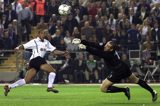 Nigel Martyn makes a spectacular save from Valencia's John Crew during the Champions League semi-final, second leg at the Mestalla in May 2001.