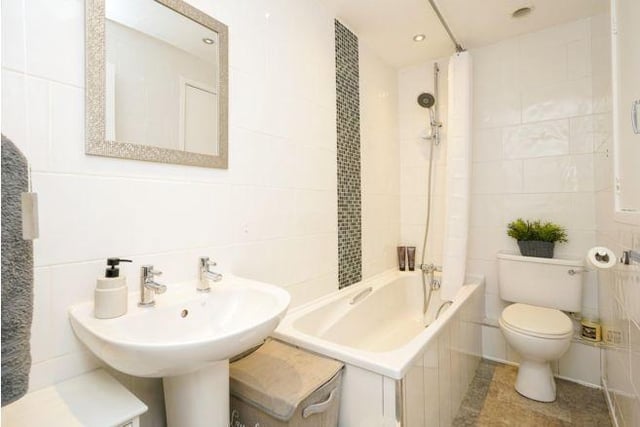 The family bathroom has a modern three-piece suite.