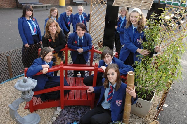 Deanery High School Year Ten pupils and teacher Vicky Butcher, who, along with other teacher Janet Fisher, built a Japanese garden as part of the 'Year of the RATT' (Raising Achievement Through Technology) in 2008