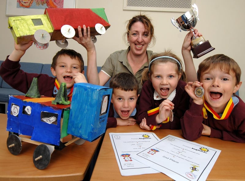 Wood Fold Primary School pupils Hannah, Matthew, Jake and Jonathan, and technology co-ordinator, teacher Sharon Dickinson, celebrate winning 2nd and 3rd places in the Regional Final of the Primary Engineer competition in 2008