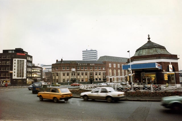 Eastgate roundabout from the direction of St. Peter's Street in March 1983. Circle House is on the left and the Marquis of Granby pub in the centre. A petrol filling station occupies the centre of the roundabout.