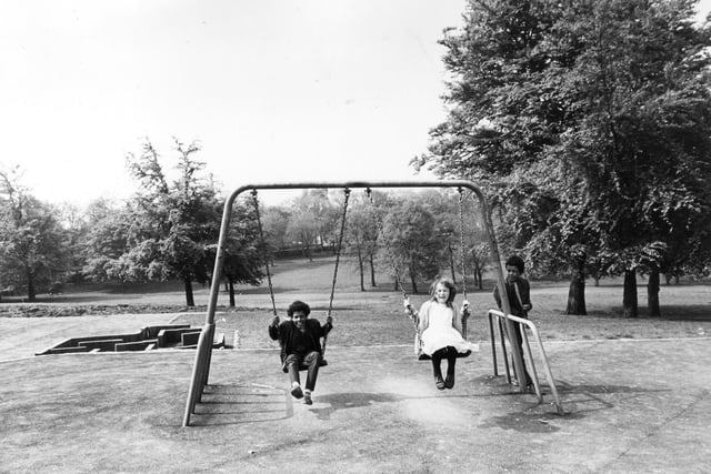 Children playing on the newly installed swings in Potternewton Park at Chapeltown. The swings were part of a scheme to improve the park which included other safe and modern play equipment. Other improvements included renovations to the old tennis courts to provide three new ones, two basketball courts and a hard surface for five-a-side football.