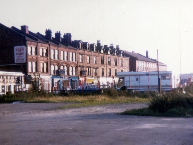 Meadow Lane from the site of the former Spread Eagle Yard looking towards a row of shops in October 1983.