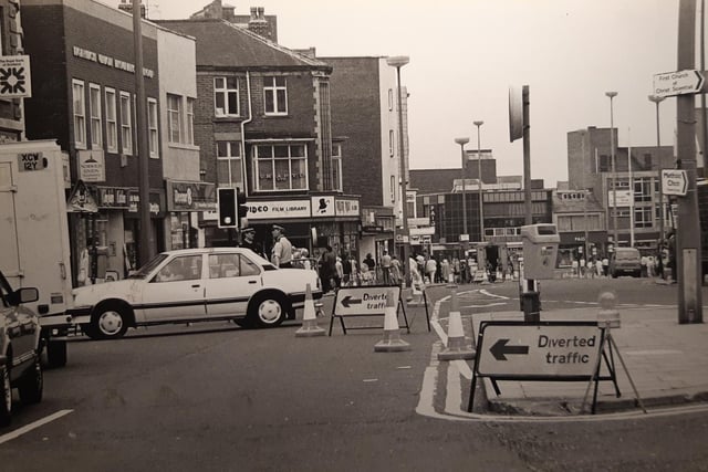 Diversions were in place here, in August 1986k after a burst water mains flooded shop basements. All west bound traffic was diverted as the sewer was fixed.