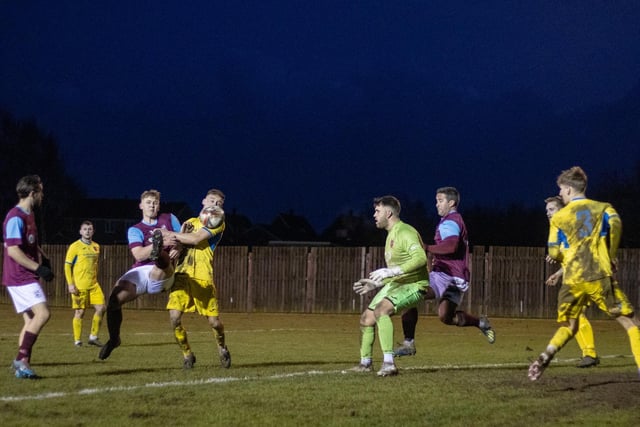 Emley's Charlie Smith scores his side's equaliser against AFC Mansfield. Picture: Mark Parsons