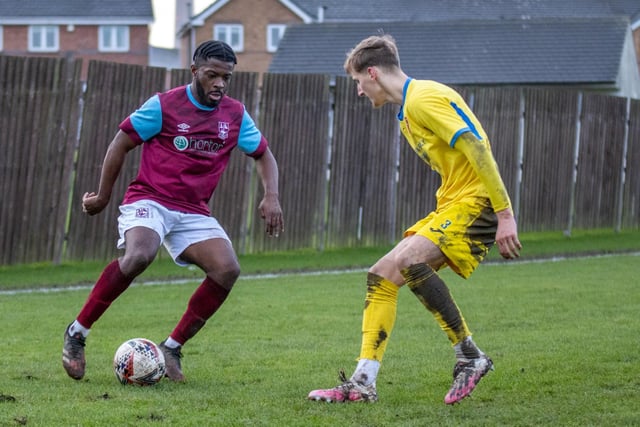 Emley's James Ngoe takes on Mansfield's Kian Sketchley. Picture: Mark Parsons