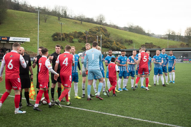 The players shake hands before the Boro v Basford match