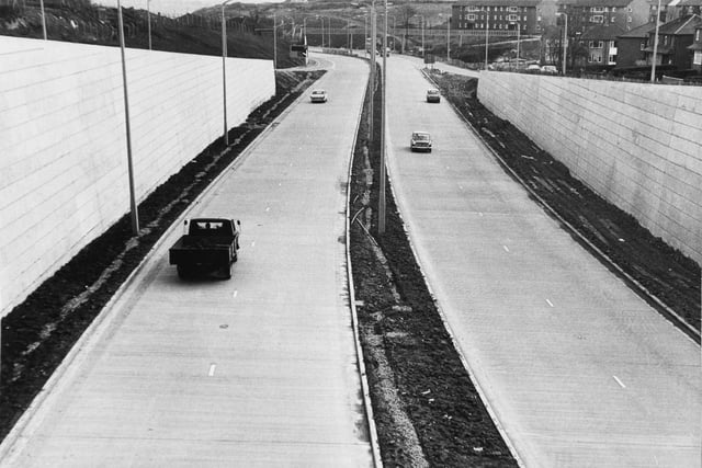 A view of a section of the Stanningley Bypass looking towards Leeds from a bridge on Swinnow Road at Bramley in March 1971.