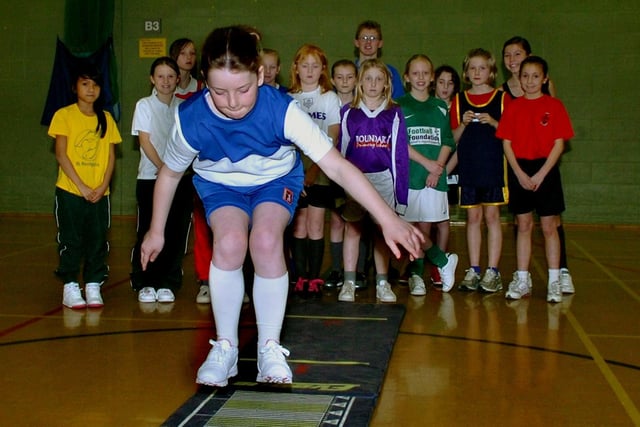 Ellie Cartmer from Bispham Endowed primary school in Blackpool takes part in the standing long jump event during the Primary Schools Indoor Athletic finals at Blackpool Sports Centre