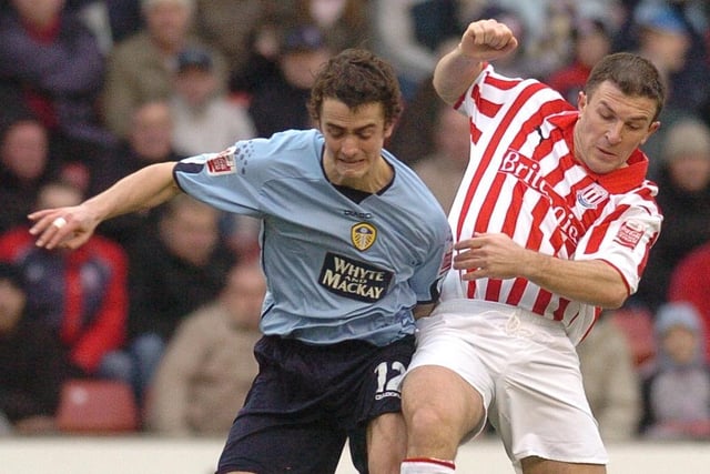 Danny Pugh battles for the ball with Stoke City's Dave Brammer.