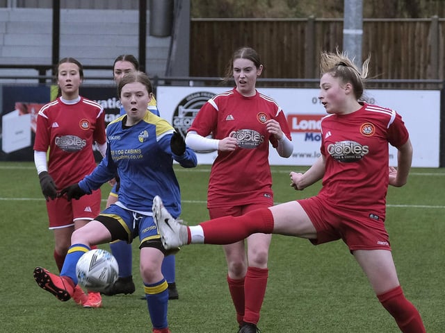 Amber Colling gets stuck in for Scarborough Ladies U18s against Brayton Belles
Photo by Richard Ponter