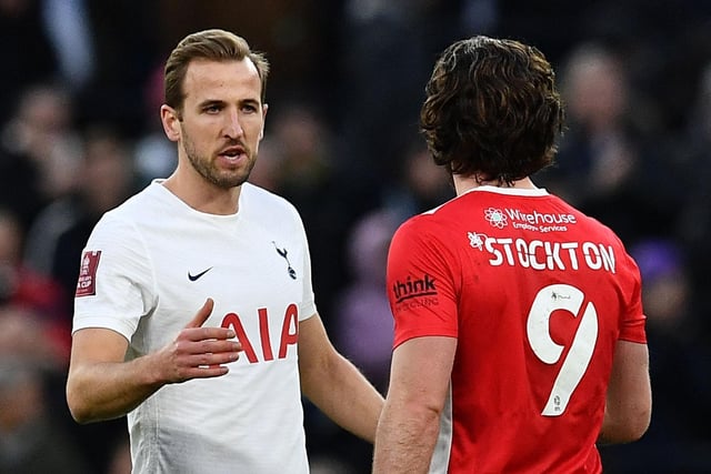 Harry Kane and Cole Stockton shake hands at the final whistle