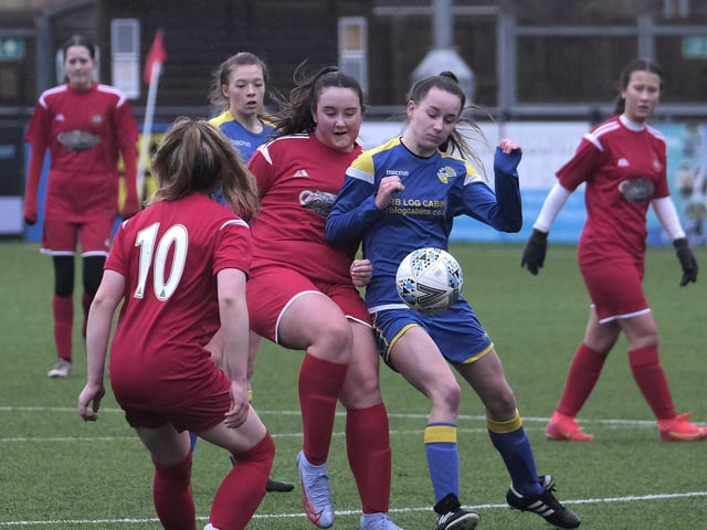 Lauren Corner gets stuck in against Brayton Belles
Photo by Richard Ponter