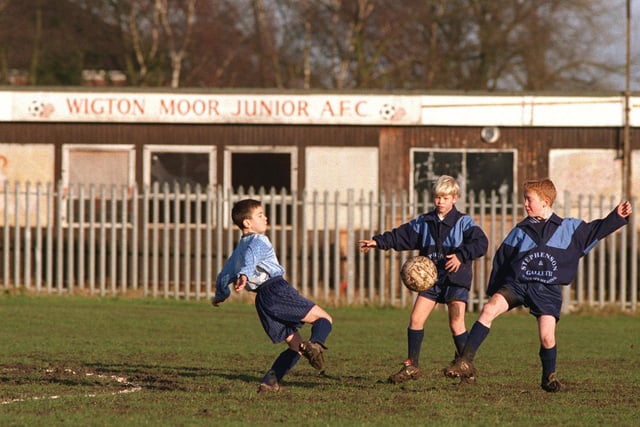 Wigton Moor Junior AFC players, from left, Robert Oxley, James Mills and Dennis Campbell in front of the clubhouse which was in need of improvement.