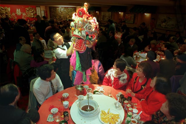 Members of the Leeds Chinese Community celebrate the New Year at the Lucky Dragon restaurant.