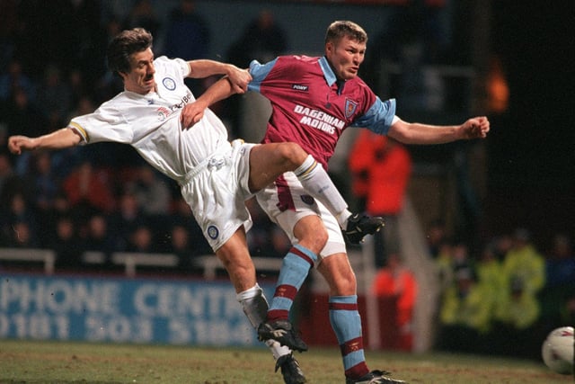 Striker Ian Rush gets into a tangle with West Ham United's Marc Rieper.