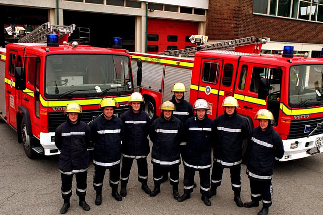 Firefighters at Hunslet Fire Station with two new state-of-the-art appliances in October 1997.