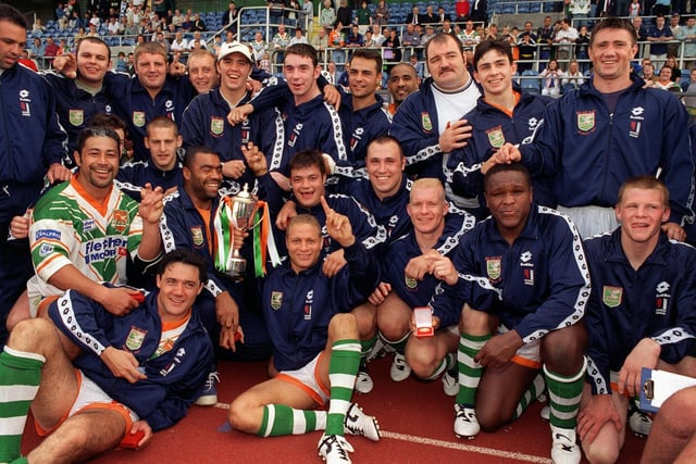 Happy Hunslet Hawks are pictured after receiving the Division 2 Championship trophy after the game with Batley Bulldogs at South Leeds Stadium in August 1997.