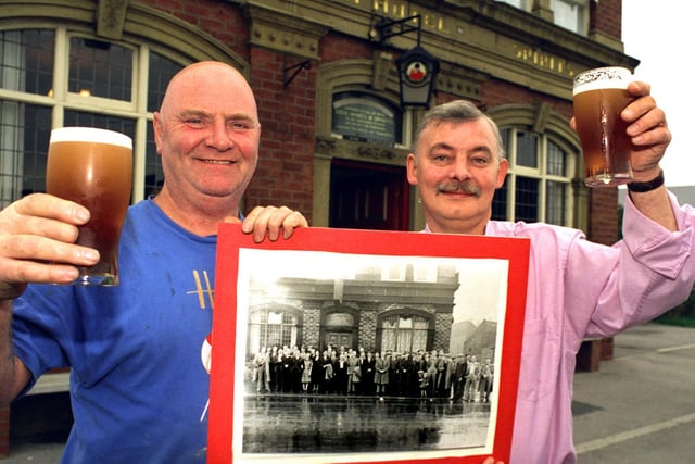 Leon Parrish (left) at The Sun pub in Hunslet with landlord Barry Franks and a group photograph taken in 1947. The pair were trying to trace a mystery boy in the picture... to buy him a pint.