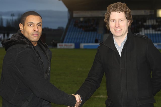 Winger Gareth Raynor pictured with chief executive Simon Riley after agreeing to join Featherstone Rovers in 2012.