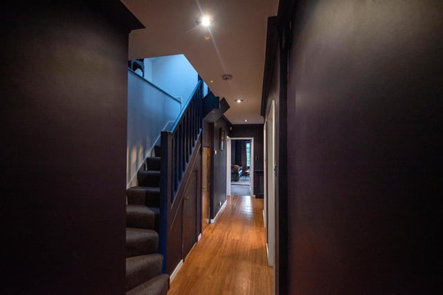 Enter into the property via the large hallway, painted in rich, dark plum tones. Just off the hallway is a useful utility room and cloak room, as well as access to all other rooms and the stairs to the upper floor.