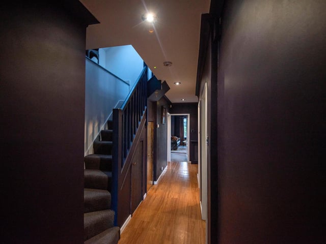 Enter into the property via the large hallway, painted in rich, dark plum tones. Just off the hallway is a useful utility room and cloak room, as well as access to all other rooms and the stairs to the upper floor.