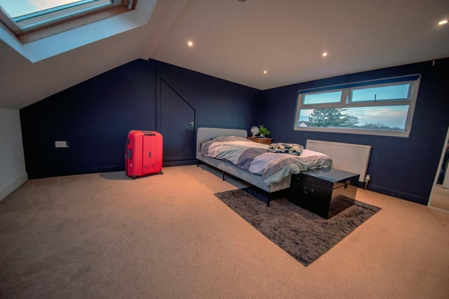 Upstairs, a double dormer has been added to create two large bedrooms.