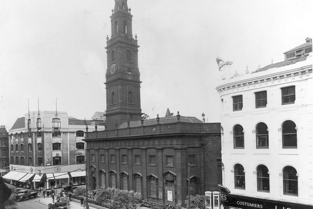 Boar Lane in April 1948. Pictured are Holy Trinity Church, C&A, and J Jones, costumiers.